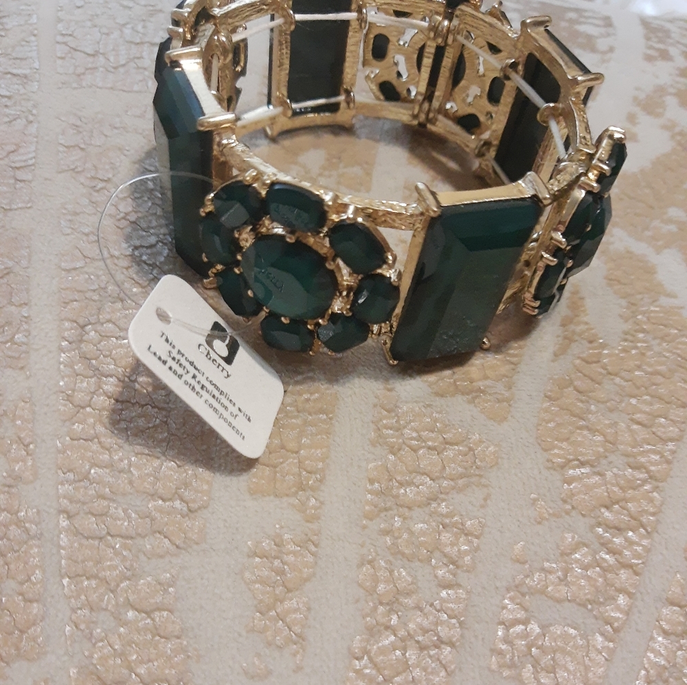 Gold with green stone bracelet